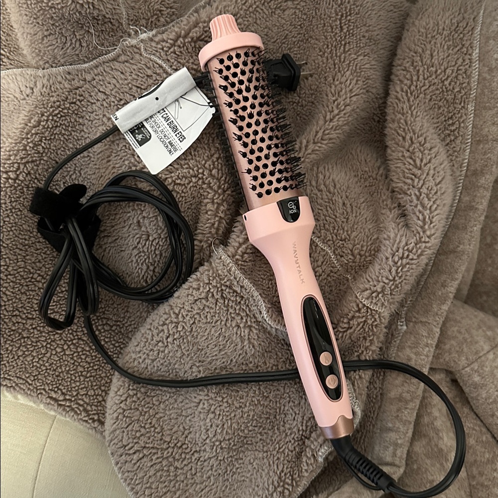 Pink Hair Styling Tool with Black Bristles